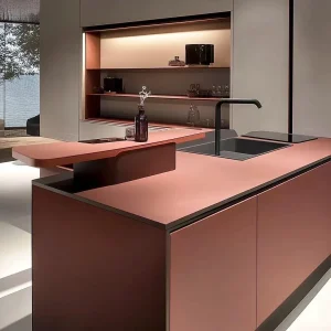 Stylish kitchen island with rose countertops and black sink