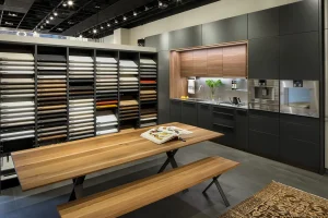 Kitchen showroom with dark cabinets and wood accents