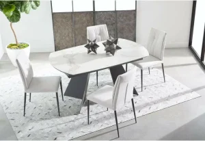 Minimalist ceramic dining table with geometric decor pieces