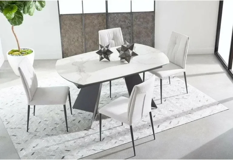 Minimalist ceramic dining table with geometric decor pieces