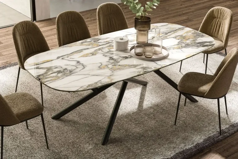 Modern ceramic dining table with a marble design and chairs