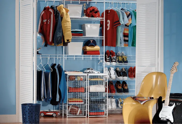 Organized wire shelving with clothes shoes and bins in a closet