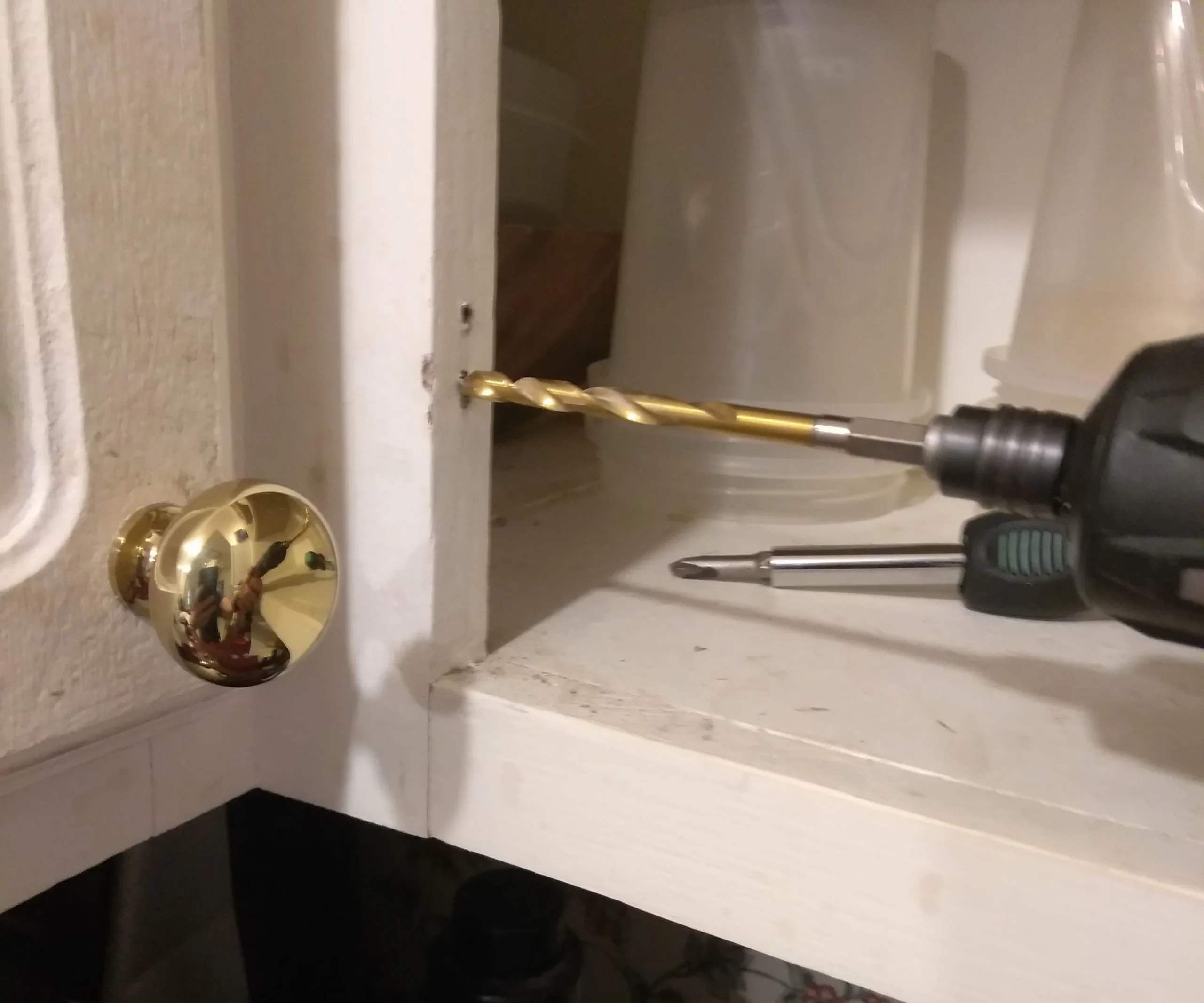 Drill repairing stripped screw hole in cabinet frame Drill repairing stripped screw hole in cabinet frame