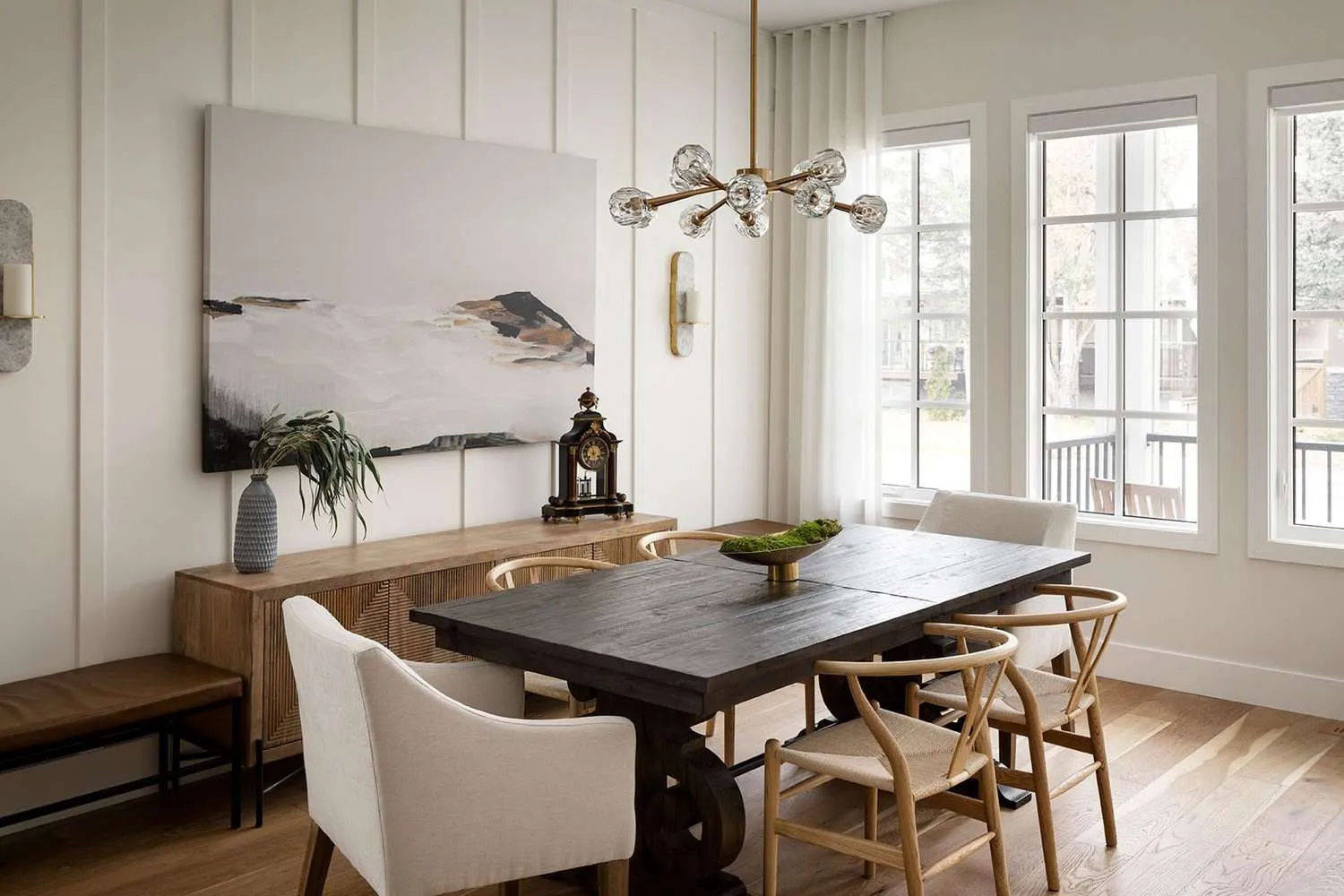 Stylish dining room with dark wood table and modern décor