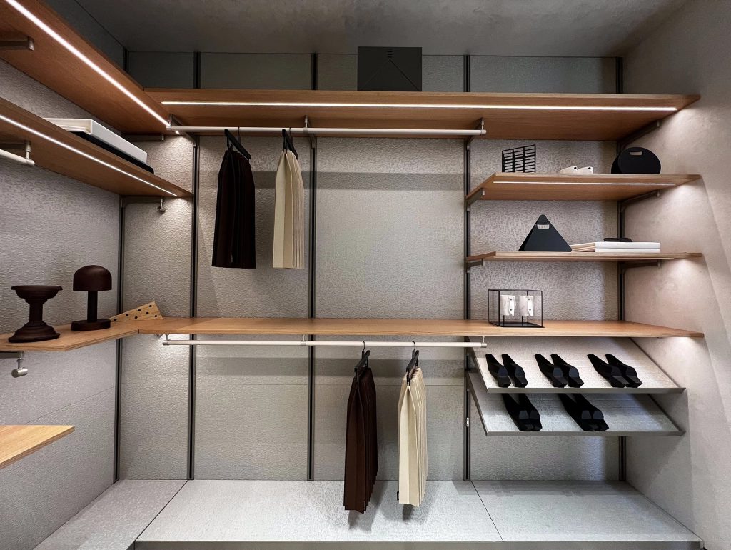 Walk-in wardrobe with shelves and organized shoe storage