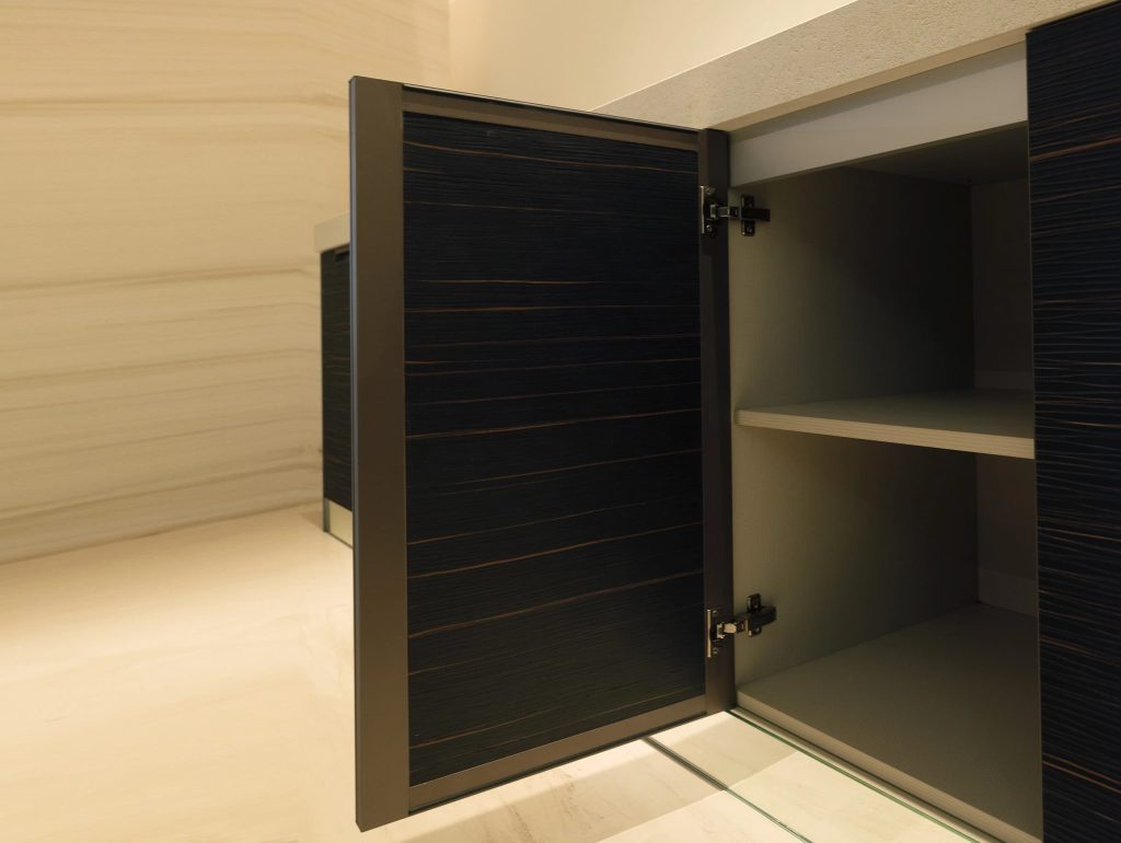 European kitchen cabinet with open door and storage inside