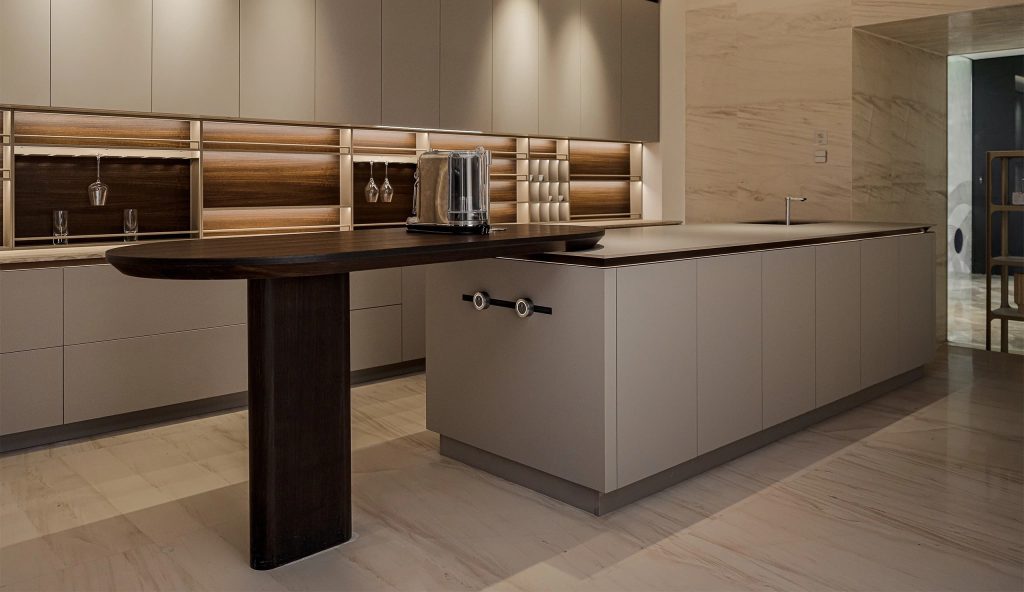 Streamlined Minimalist Kitchen Cabinet with minimalist island and clean, modern lines.